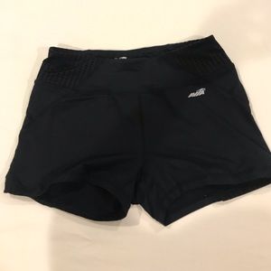 All black tight athletic shorts